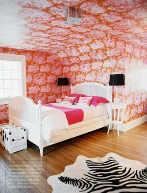 Interior design and animal prints - pinky red bedroom with cowhide rug.jpeg